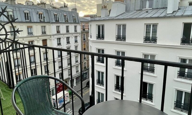 Parisian balcony view, showcasing the city's architectural beauty
